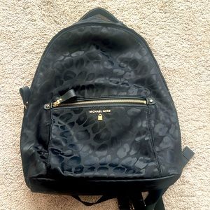 Michael Kors black leopard backpack- EUC